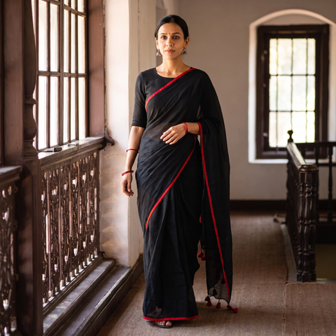 Black Plain Pure Mul Cotton Ready To Wear Saree, draped and worn by a woman, AI visual of the saree, iTokri