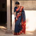 Blue Plain Silk Cotton Zari Border Saree with Blouse Piece, draped and worn by a woman, AI visual of the saree, iTokri