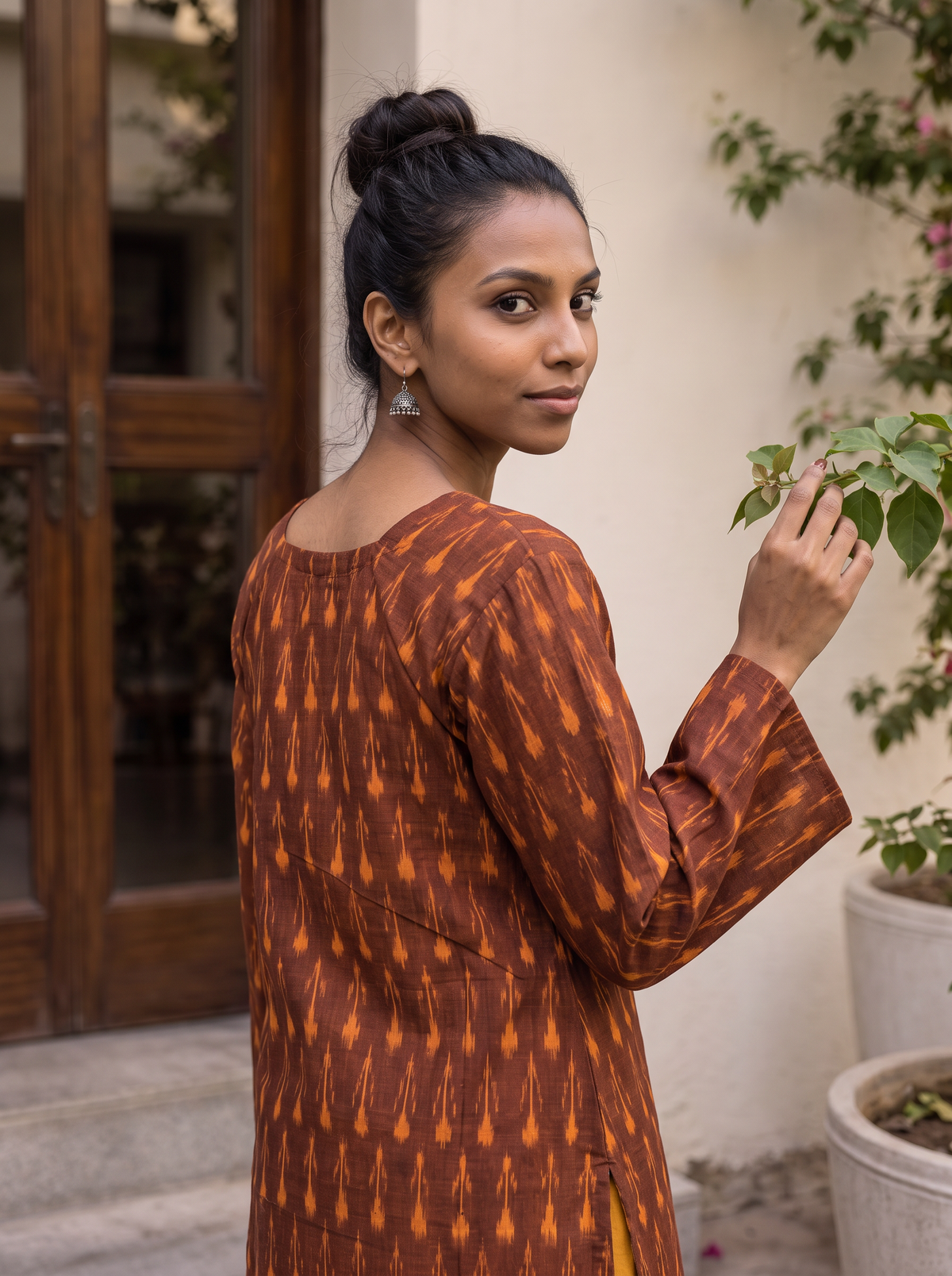 Brown Pochampally Ikat Cotton Bud Kurta, over the shoulder view, rust brown cotton, orange buds, soft edges, AI visual of the kurta, iTokri