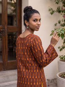 Brown Pochampally Ikat Cotton Bud Kurta, over the shoulder view, rust brown cotton, orange buds, soft edges, AI visual of the kurta, iTokri