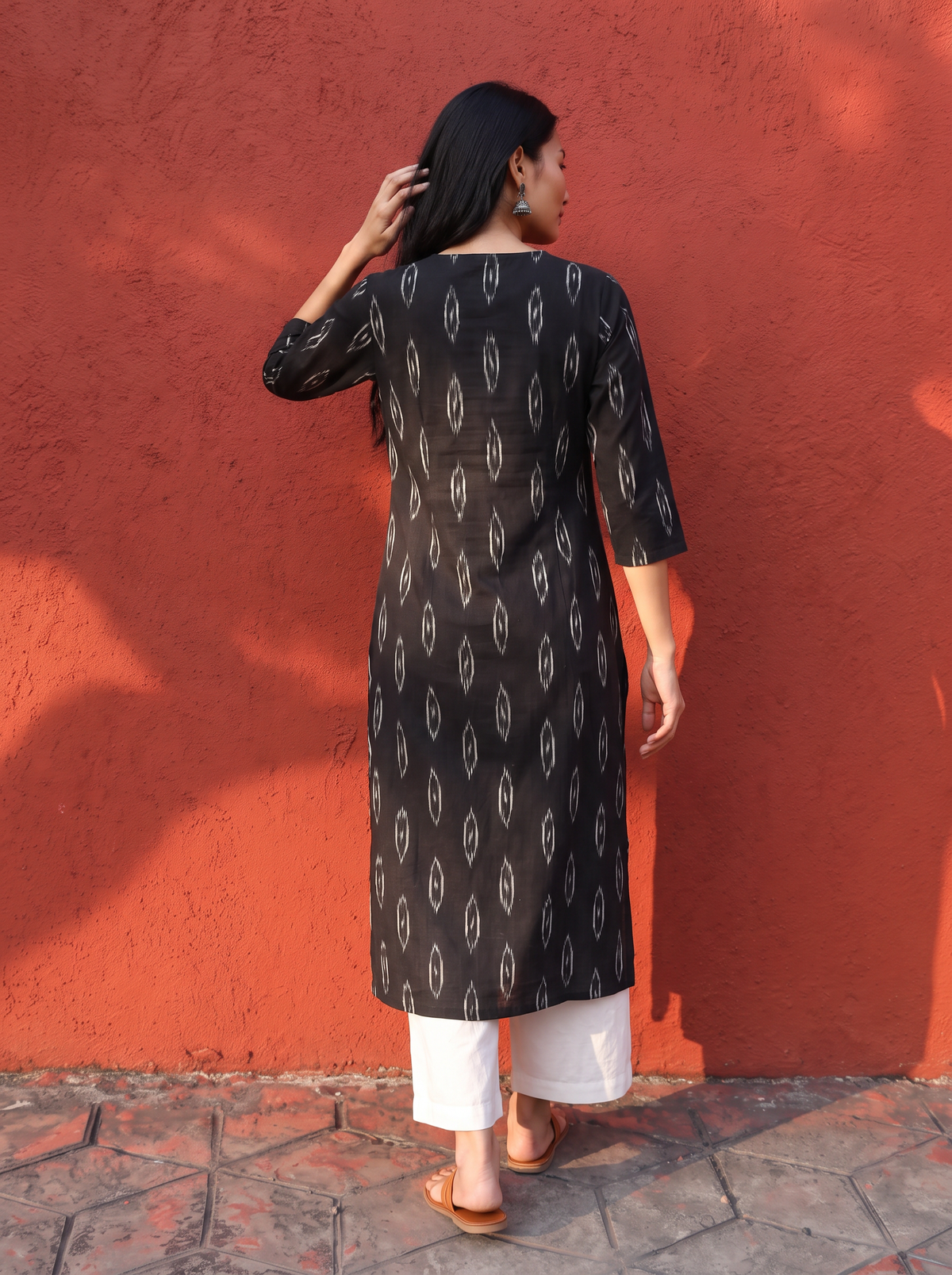 Black Pochampally Ikat Cotton Pintuck Yoke Kurta, back view, straight, calf length, keyhole, 2 buttons, AI visual of the kurta, iTokri