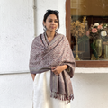 Brown Pochampally Ikat Pure Handwoven Merino Wool x Silk Shawl, worn by a model, AI visual of the shawl, iTokri