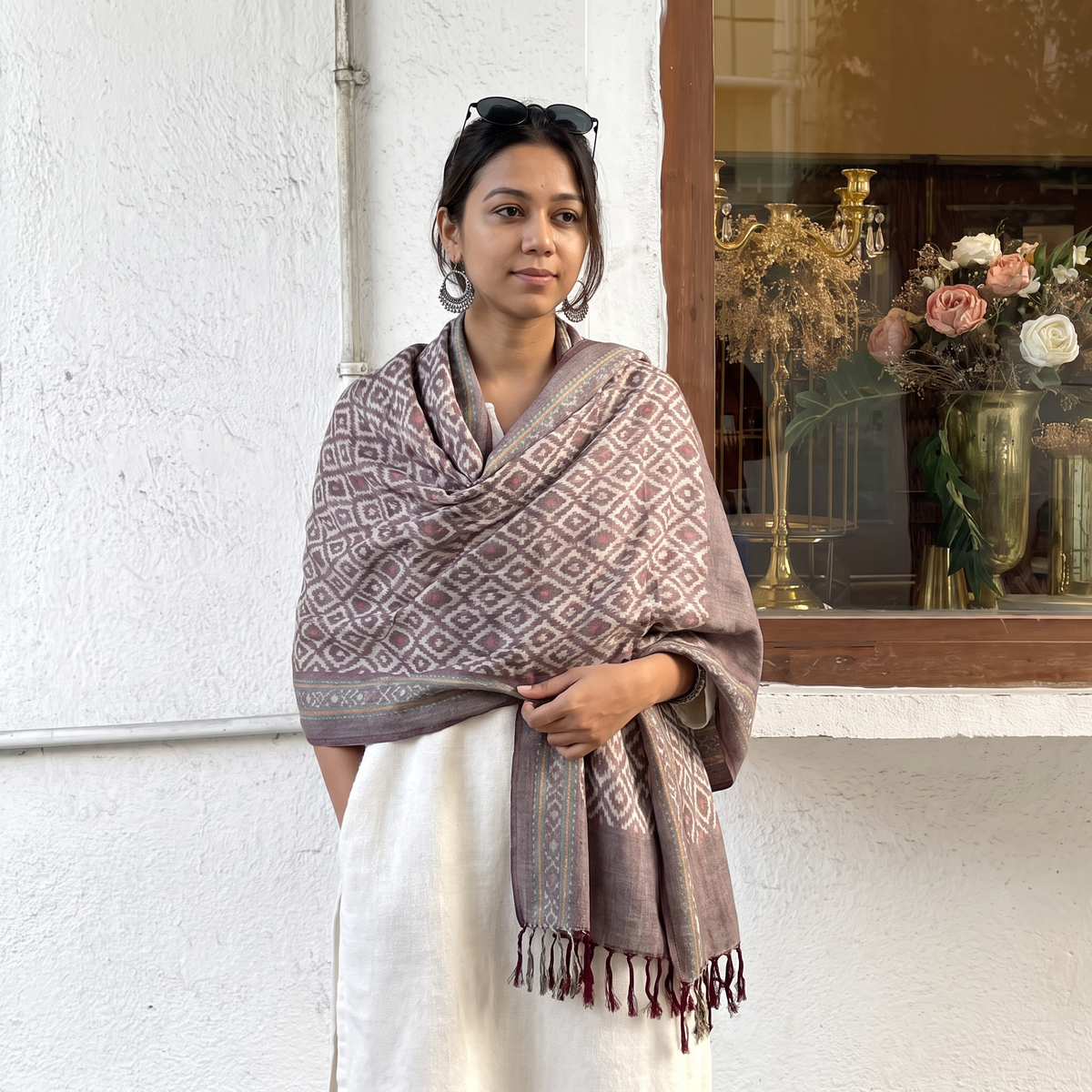Brown Pochampally Ikat Pure Handwoven Merino Wool x Silk Shawl, worn by a model, AI visual of the shawl, iTokri