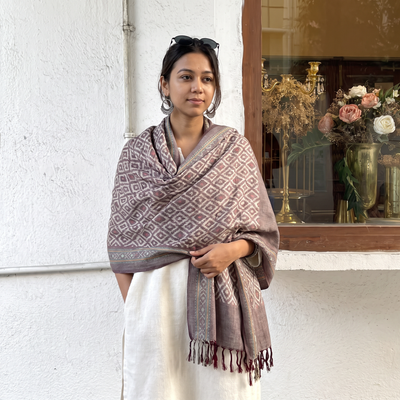 Brown Pochampally Ikat Pure Handwoven Merino Wool x Silk Shawl, worn by a model, AI visual of the shawl, iTokri