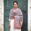 Pink Pochampally Ikat Pure Handwoven Merino Wool x Silk Shawl, worn by a model, AI visual of the shawl, iTokri