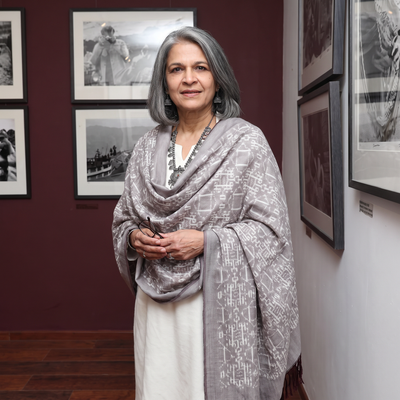 Grey Pochampally Ikat Pure Handwoven Merino Wool x Silk Shawl, worn by a model, AI visual of the shawl, iTokri