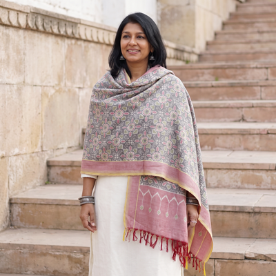 Grey Pochampally Ikat Pure Handwoven Merino Wool x Silk Shawl, worn by a model, AI visual of the shawl, iTokri