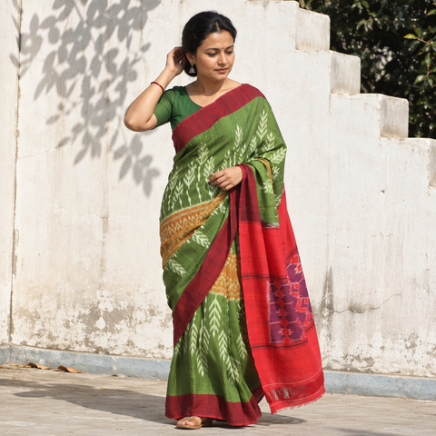 Green Pochampally Ikat Weave Handloom Cotton Saree, draped and worn by a woman, AI visual of the saree, iTokri