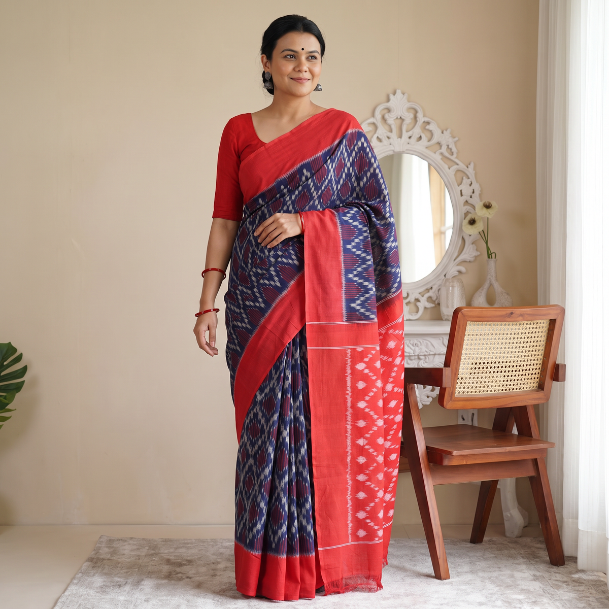 Blue Pochampally Ikat Weave Handloom Cotton Saree, draped and worn by a woman, AI visual of the saree, iTokri