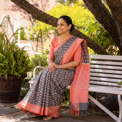 Grey Pochampally Ikat Weave Mercerised Cotton Saree, draped and worn by a woman, AI visual of the saree, iTokri