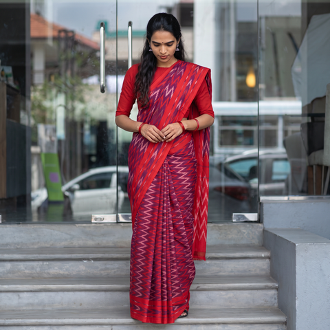 Red Pochampally Ikat Weave Mercerised Cotton Saree, draped and worn by a woman, AI visual of the saree, iTokri
