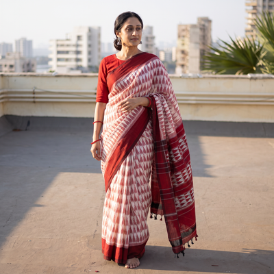 Maroon Pochampally Ikat Weave Pure Handloom Cotton Saree, draped and worn by a woman, AI visual of the saree, iTokri