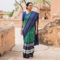 Green Pochampally Ikat Weave Pure Handloom Cotton Saree, draped and worn by a woman, AI visual of the saree, iTokri