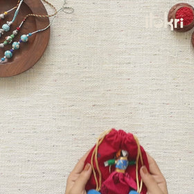 Handcrafted Patwa Threadwork Blue Pottery Beads Rakhi with Potli 08