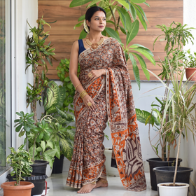 Brown Printed Cotton Kalamkari Saree, draped and worn by a woman, AI visual of the saree, iTokri