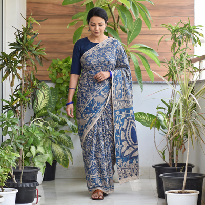 Beige Printed Cotton Kalamkari Saree, draped and worn by a woman, AI visual of the saree, iTokri