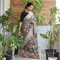 Black Printed Cotton Nellore Kalamkari Saree, draped and worn by a woman, AI visual of the saree, iTokri