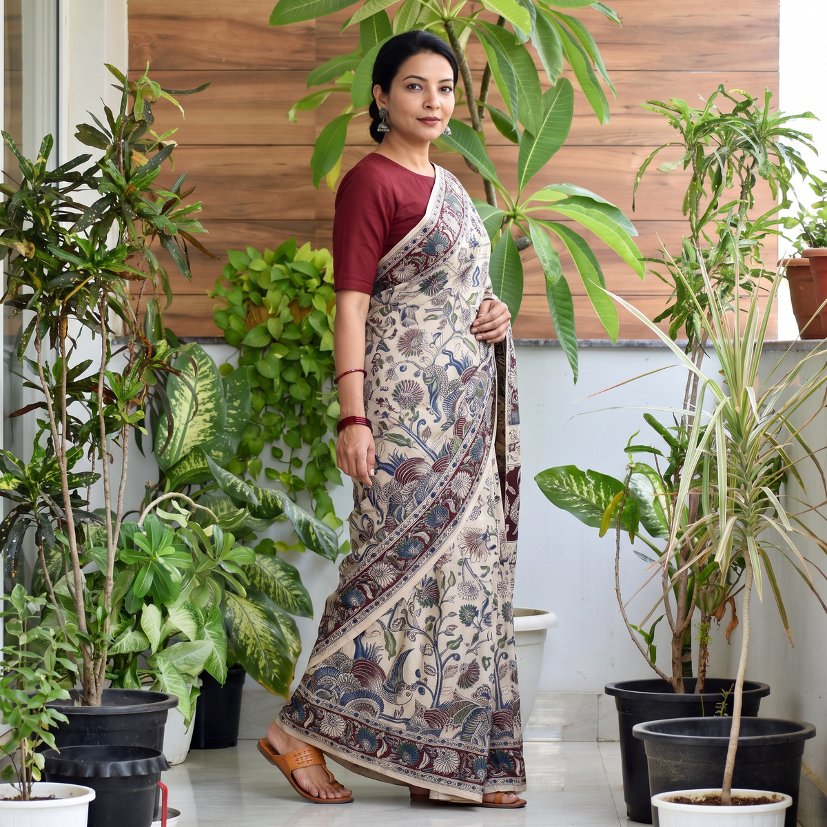 Beige Printed Cotton Nellore Kalamkari Saree, draped and worn by a woman, AI visual of the saree, iTokri