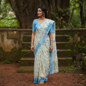 Beige Pure Cotton Handloom Bengal Tant Saree with Zari & Thread Work, draped and worn by a woman, AI visual of the saree, iTokri