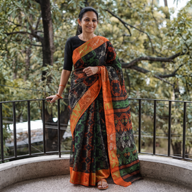 Black Pure Cotton Handloom Bengal Tant Saree with Zari & Thread Work, draped and worn by a woman, AI visual of the saree, iTokri