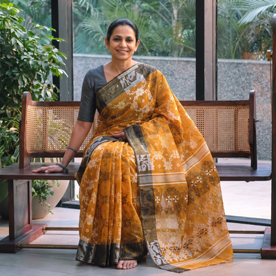 Yellow Pure Cotton Handloom Bengal Tant Saree with Zari & Thread Work, draped and worn by a woman, AI visual of the saree, iTokri
