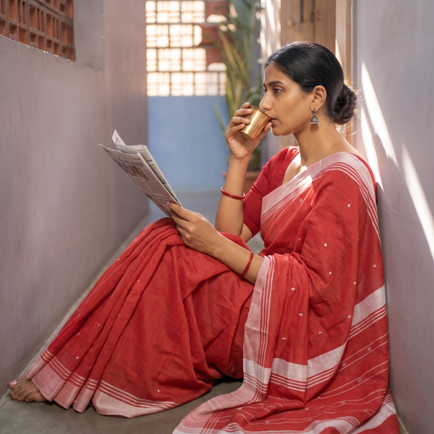 Red Pure Handloom Cotton Thread Buti Chanderi Saree, draped and worn by a woman, AI visual of the saree, iTokri