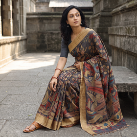 Grey Pure Handloom Desi Tussar Silk Handpainted Srikalahasti Pen Kalamkari Saree with Zari Border, draped and worn by a woman, AI visual of the saree, iTokri