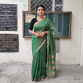 Green Pure Handloom Tissue Zari Buti Bead Work Katan Silk Chanderi Saree, draped and worn by a woman, AI visual of the saree, iTokri