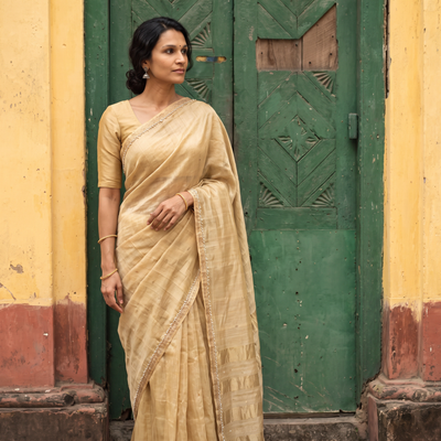 Beige Pure Handloom Tissue Zari Buti Bead Work Katan Silk Chanderi Saree, draped and worn by a woman, AI visual of the saree, iTokri