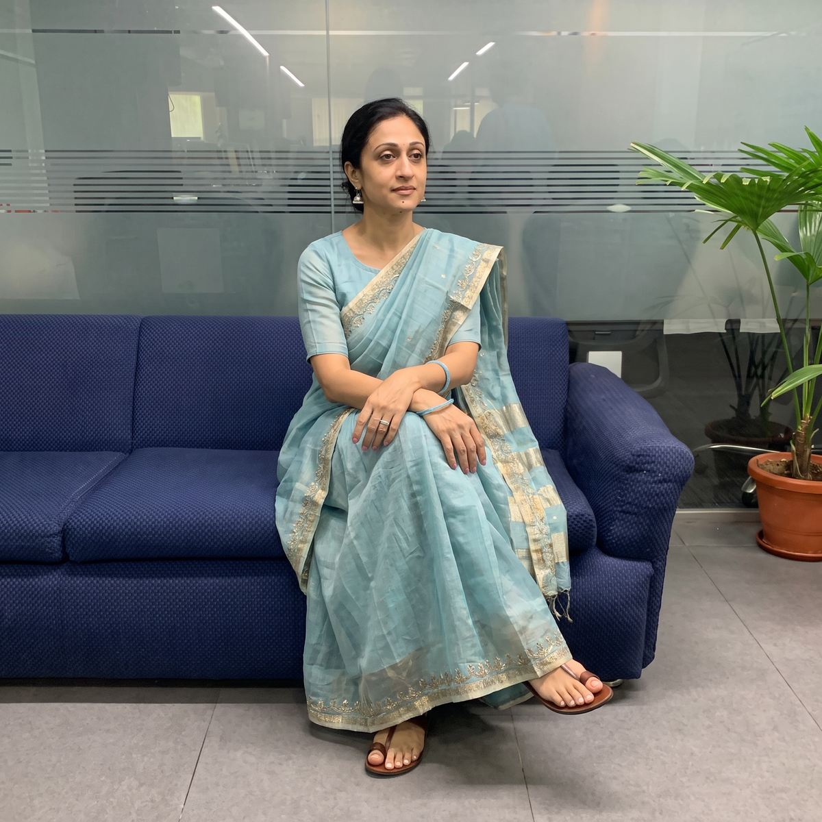 Blue Pure Handloom Tissue Zari Buti Bead Work Katan Silk Chanderi Saree, draped and worn by a woman, AI visual of the saree, iTokri