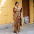 Brown Pure Handloom Tussar Silk Saree in Bengal Hand Block Prints, draped and worn by a woman, AI visual of the saree, iTokri