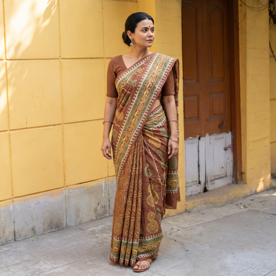 Brown Pure Handloom Tussar Silk Saree in Bengal Hand Block Prints, draped and worn by a woman, AI visual of the saree, iTokri