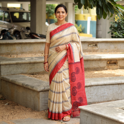 Beige Pure Handloom Tussar Silk Saree in Bengal Hand Block Prints, draped and worn by a woman, AI visual of the saree, iTokri