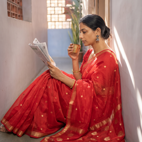 Red Pure Handloom Zari Buta Katan Silk Chanderi Saree, draped and worn by a woman, AI visual of the saree, iTokri
