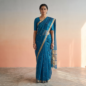 Blue Pure Handloom Zari Buta Katan Silk Chanderi Saree, draped and worn by a woman, AI visual of the saree, iTokri