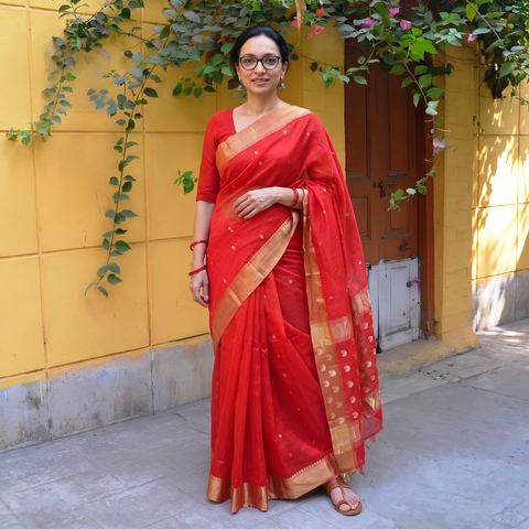 Red Pure Handloom Zari Buta Katan Silk Chanderi Saree, draped and worn by a woman, AI visual of the saree, iTokri