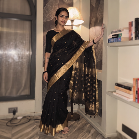 Black Pure Handloom Zari Buta Katan Silk Chanderi Saree, draped and worn by a woman, AI visual of the saree, iTokri