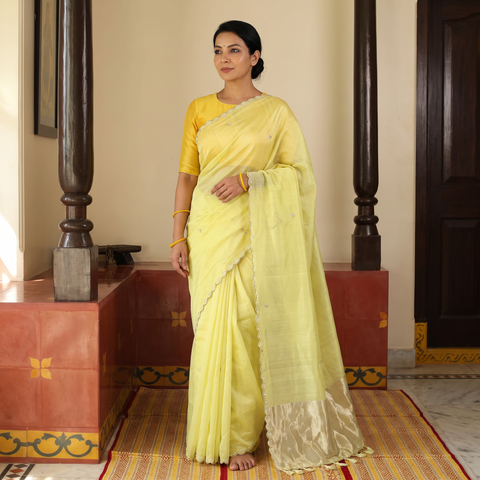 Yellow Pure Handloom Zari Pallu Bead Work Chanderi Silk Saree, draped and worn by a woman, AI visual of the saree, iTokri