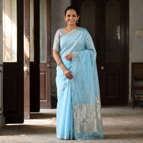 Blue Pure Handloom Zari Pallu Bead Work Chanderi Silk Saree, draped and worn by a woman, AI visual of the saree, iTokri