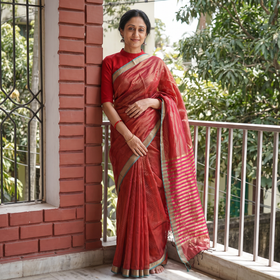 Pink Pure Handloom Zari Stripes Katan Silk Chanderi Saree, draped and worn by a woman, AI visual of the saree, iTokri