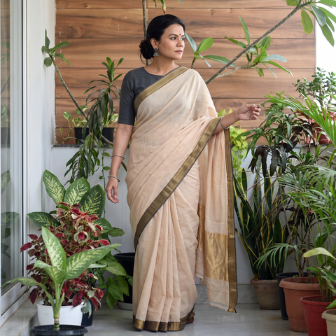 Beige Pure Handwoven Mangalagiri Cotton Saree with Nizam Zari Border, draped and worn by a woman, AI visual of the saree, iTokri