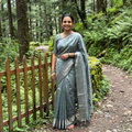 Green Pure Handwoven Mangalagiri Silk Cotton Pattu Saree with Zari Border, draped and worn by a woman, AI visual of the saree, iTokri