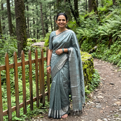 Green Pure Handwoven Mangalagiri Silk Cotton Pattu Saree with Zari Border, draped and worn by a woman, AI visual of the saree, iTokri