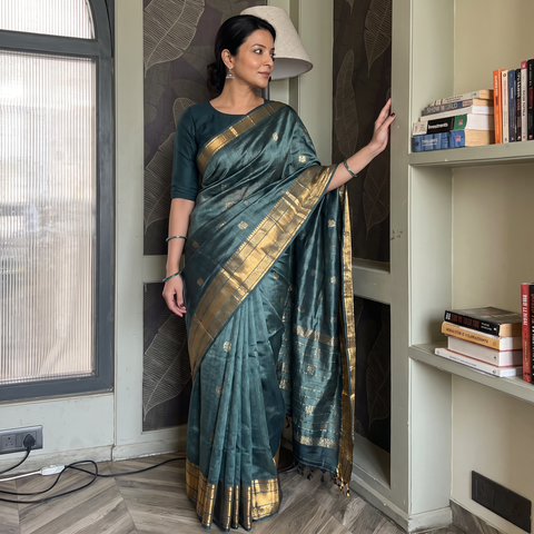Green Pure Handwoven Mangalagiri Silk Cotton Pattu Saree with Zari Border, draped and worn by a woman, AI visual of the saree, iTokri