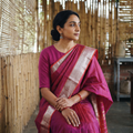 Pink Pure Handwoven Mangalagiri Silk Cotton Pattu Saree with Zari Border, draped and worn by a woman, AI visual of the saree, iTokri