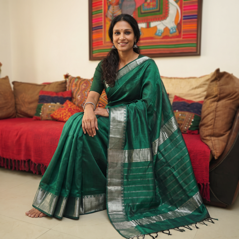 Green Pure Handwoven Mangalagiri Silk Cotton Pattu Saree with Zari Border, draped and worn by a woman, AI visual of the saree, iTokri