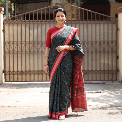 Green Pure Handwoven Sambalpuri Ikat Cotton Saree, draped and worn by a woman, AI visual of the saree, iTokri
