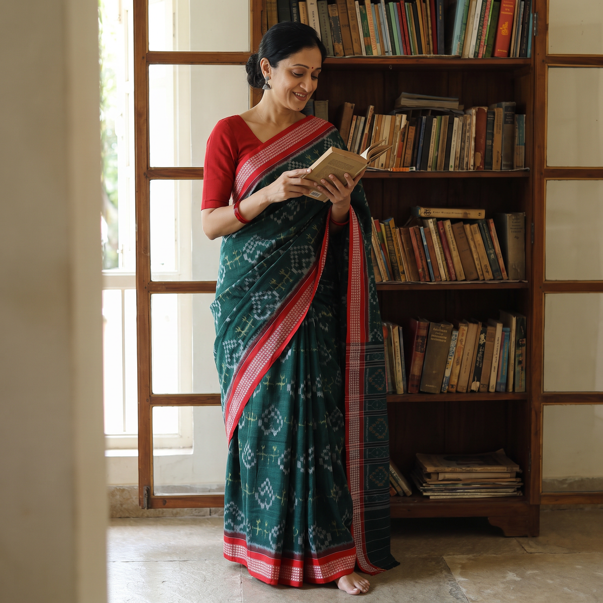 Green Pure Handwoven Sambalpuri Ikat Cotton Saree, draped and worn by a woman, AI visual of the saree, iTokri