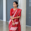 Red Pure Handwoven Sambalpuri Ikat Cotton Saree, draped and worn by a woman, AI visual of the saree, iTokri