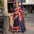 Black Pure Handwoven Sambalpuri Ikat Cotton Saree, draped and worn by a woman, AI visual of the saree, iTokri